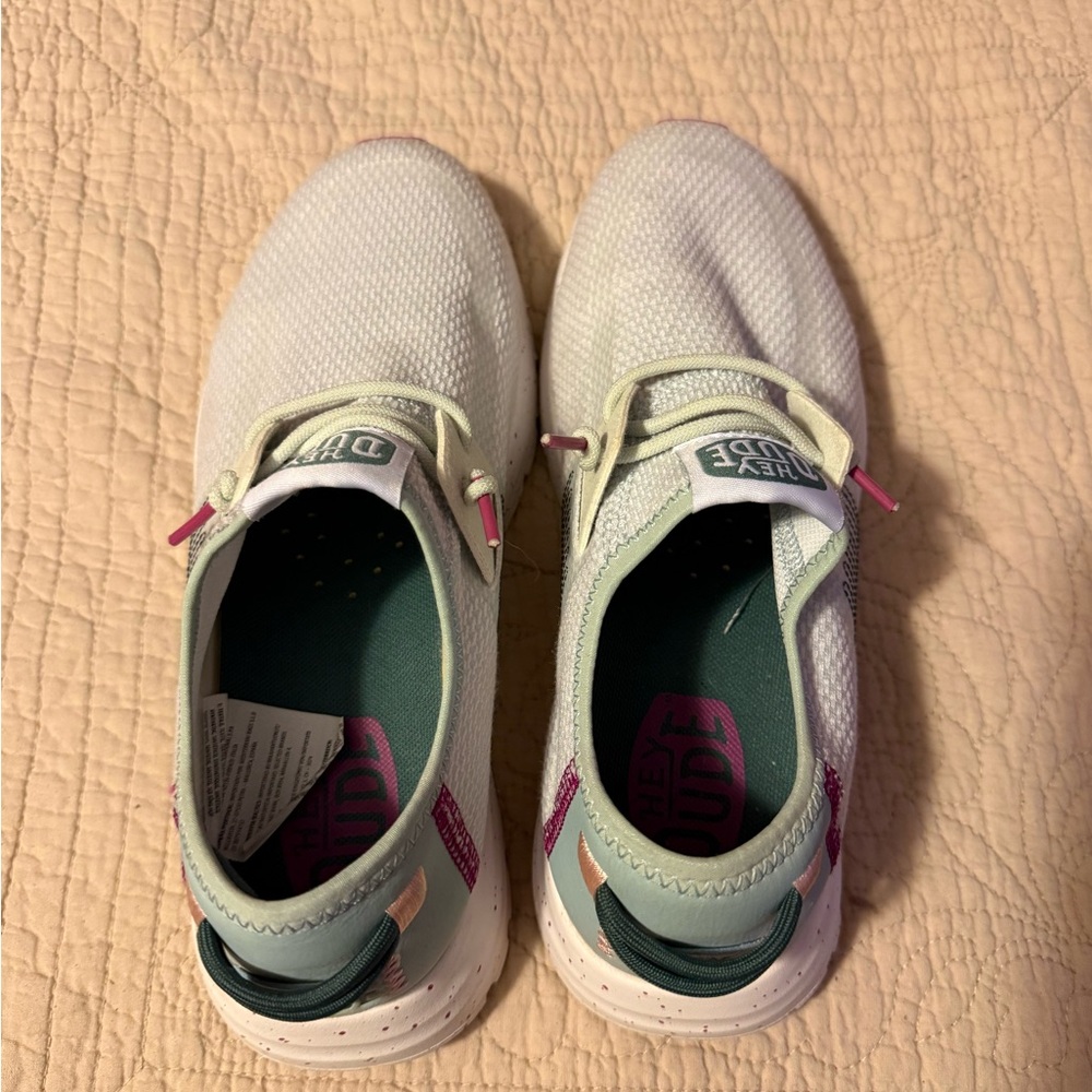 Hey Dude Women’s White Slip-On Sneakers with Pink and Mint Green Accents